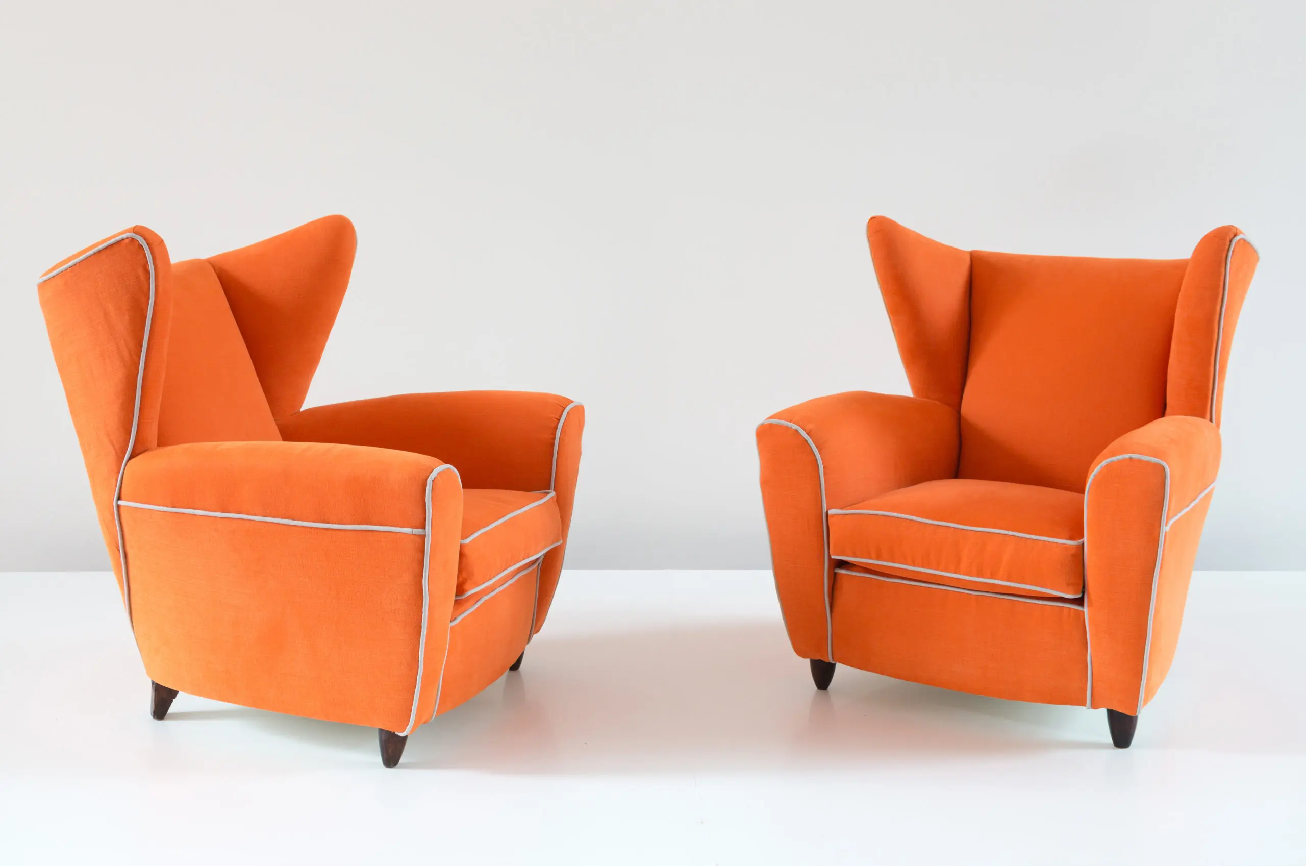 Pair of orange large wingback armchairs,att. to Melchiorre Bega, 1952 — image 2